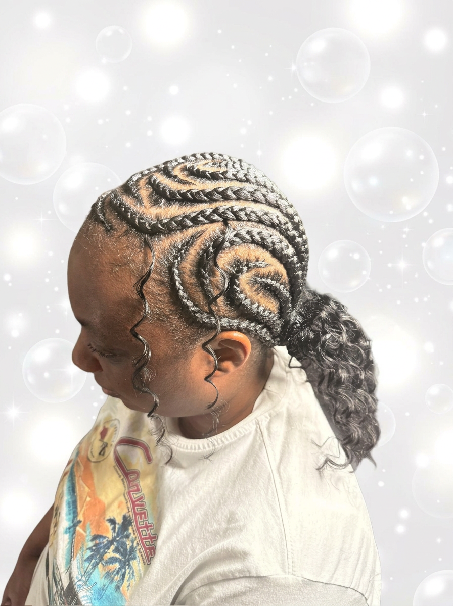 Flip over cornrow braids into a curly ponytail
